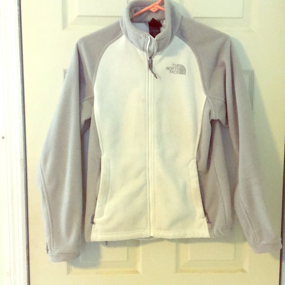 White and grey Northface jacket